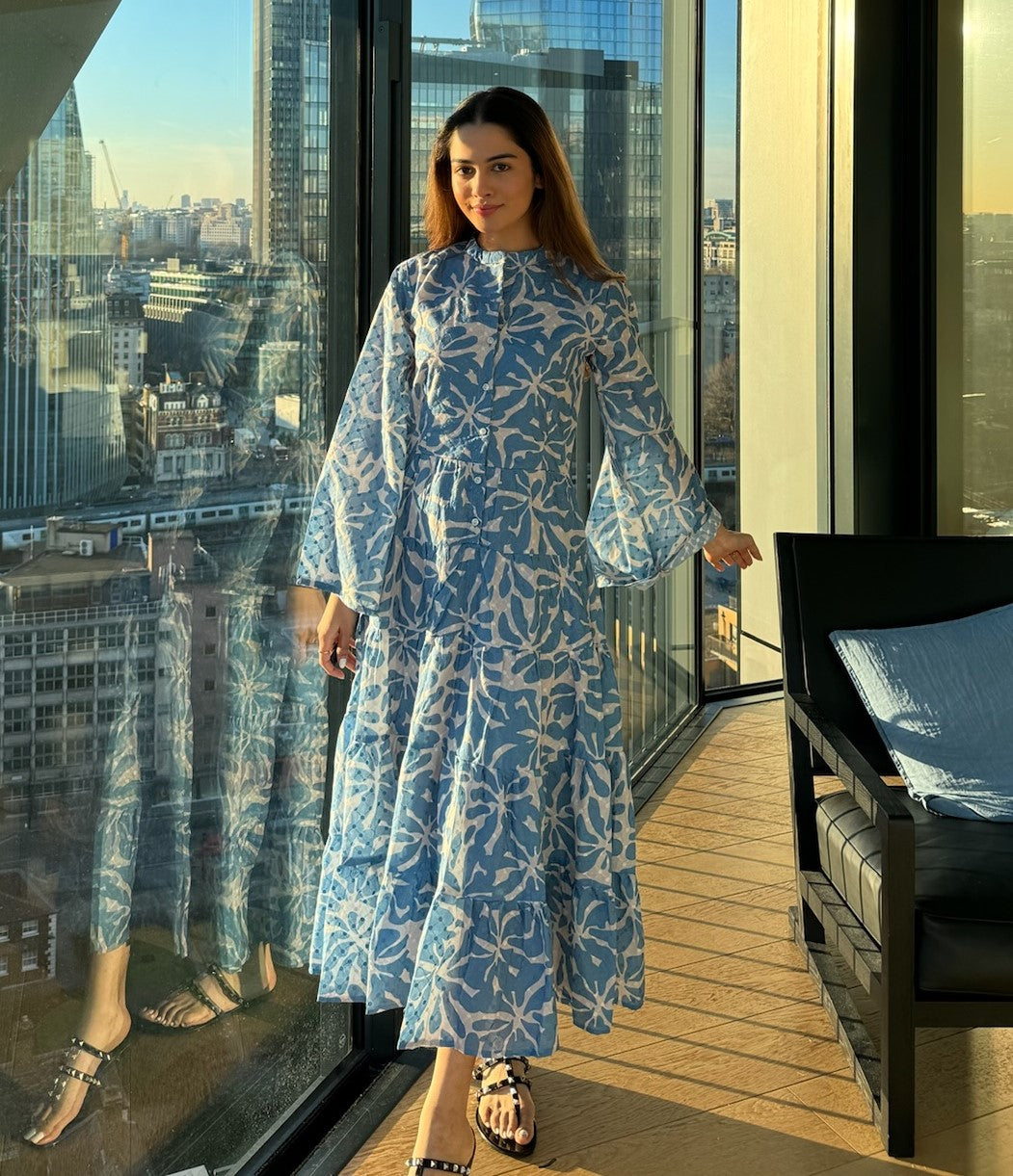 Discover the epitome of summer elegance with our stunning blue printed Schiffli maxi dress. Embrace timeless style with intricate Schiffli fabric, featuring a beautiful blue summer print.